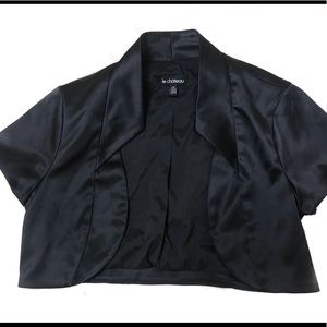 Small classy vest. perfect with a dress. Like new.